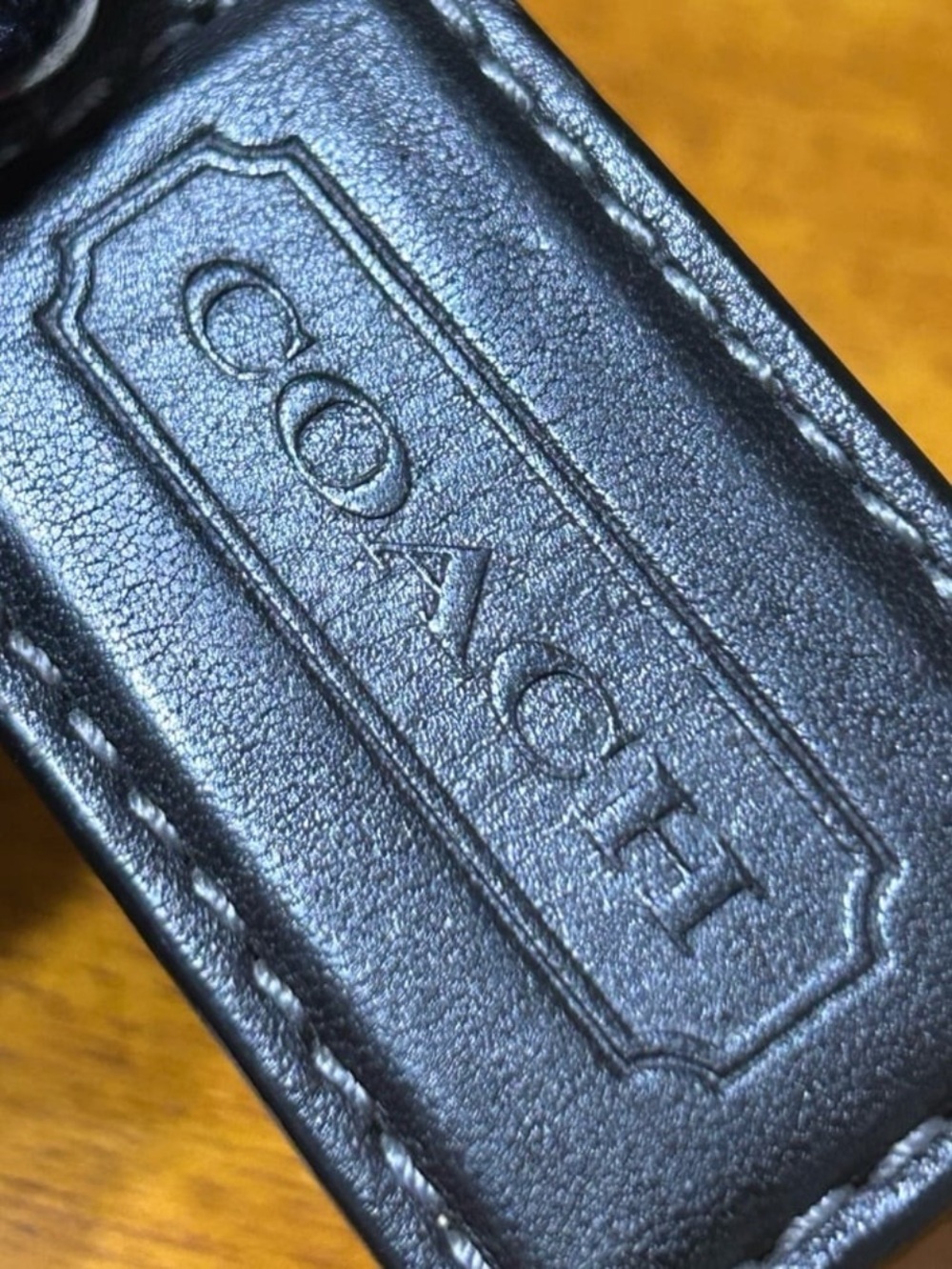 Black Coach hangtag
